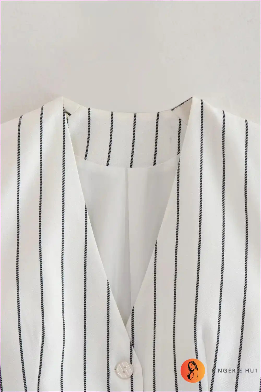 Define Your Fall Style With Our Chic Fall Striped Bare Back Double Layer Vest. It Exudes Timeless Elegance