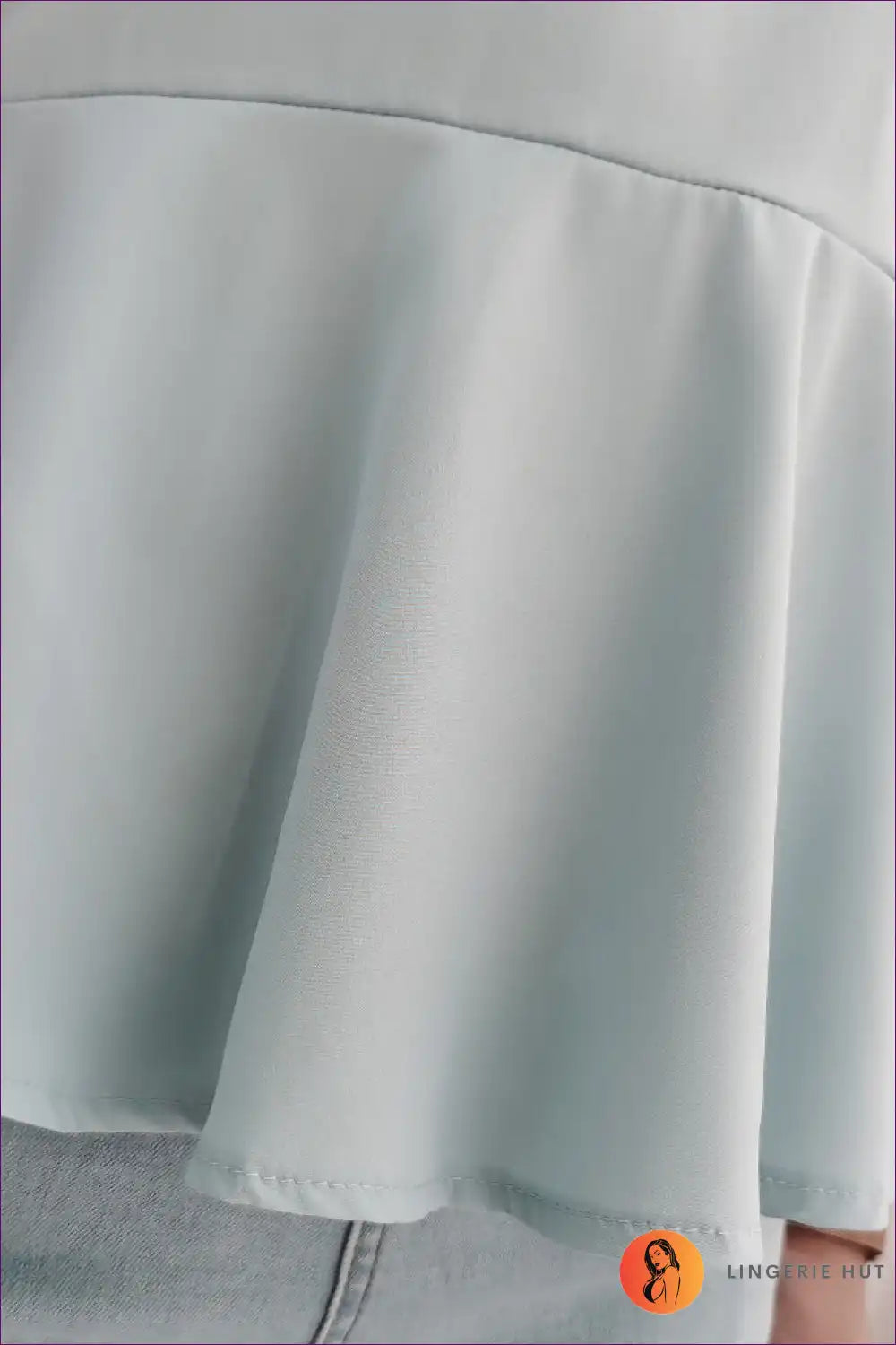 Lingerie Hut’s Elegant Ruffle Asymmetric Blouse Delivers Laidback Sophistication With Its Breezy Polyester