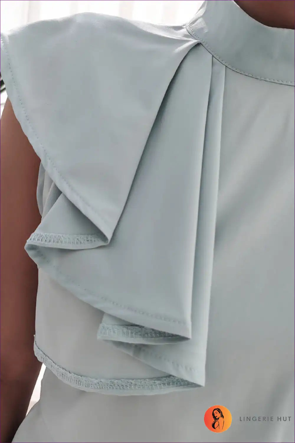 Lingerie Hut’s Elegant Ruffle Asymmetric Blouse Delivers Laidback Sophistication With Its Breezy Polyester