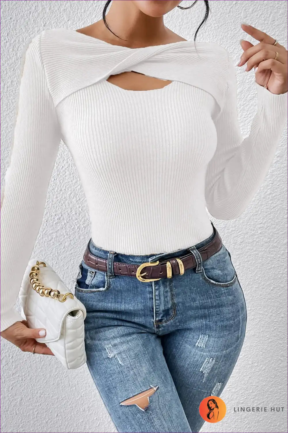 Elevate Your Style With Our Elegant Twisted Cutout Top, a Sophisticated Long Sleeve Crafted In Cozy Jersey.