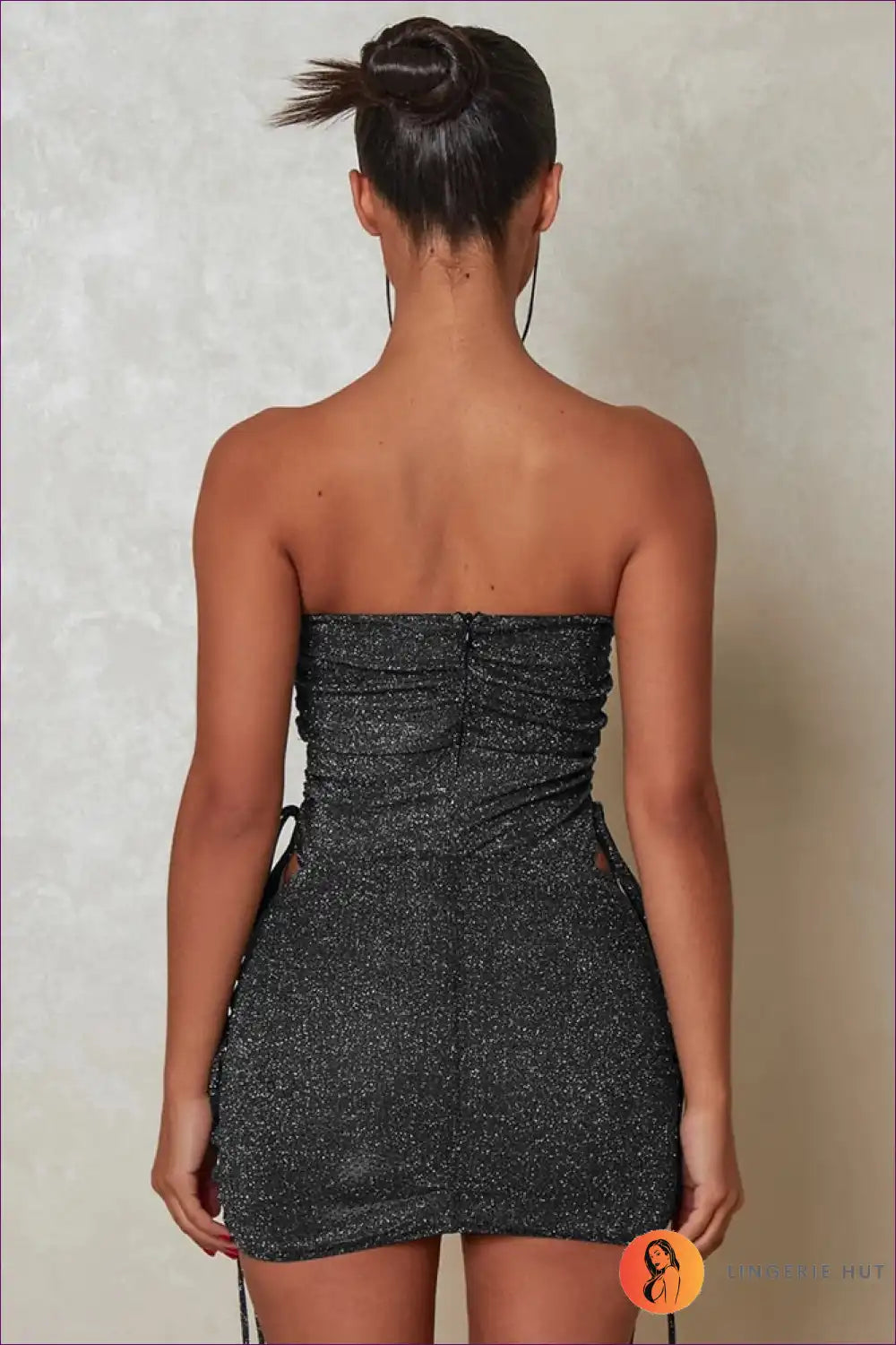 Make a Dazzling Entrance With Our Glitter Detail Strapless Bodysuit & Mini Skirt Set. Designed To Make You