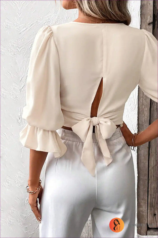 Elevate Your Summer Style With Our Graceful Puff Sleeve V-neck Slim Fit Shirt Top. It’s Elegance Redefined.