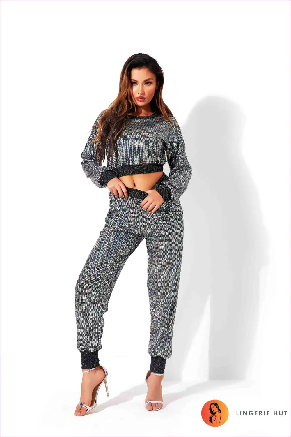 Get Ready To Turn Heads With Our High Waist Crop Sweatshirt & Glossy Track Bottoms! a Sexy, Sequined Duo