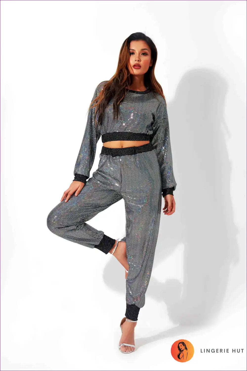 Get Ready To Turn Heads With Our High Waist Crop Sweatshirt & Glossy Track Bottoms! a Sexy, Sequined Duo