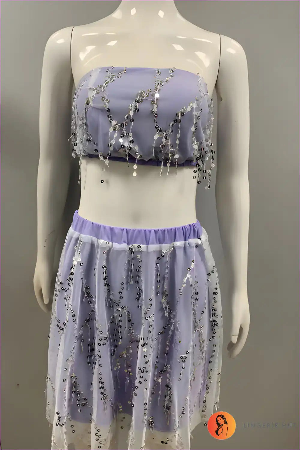 Ignite The Night With Lingerie Hut’s Seductive Sequined Tube Top Set. Slim Fit, Tassel Skirt, And Eye-catching