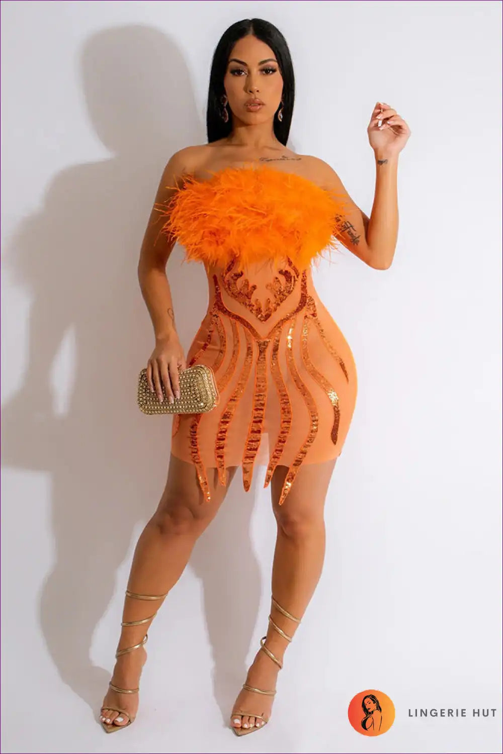 Ignite The Dance Floor In This Sexy Strapless Bodycon Featuring Captivating Elegance Of Sequins & Feathers.