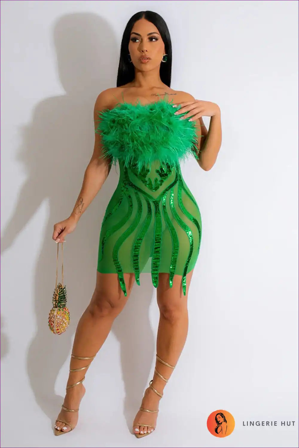 Ignite The Dance Floor In This Sexy Strapless Bodycon Featuring Captivating Elegance Of Sequins & Feathers.