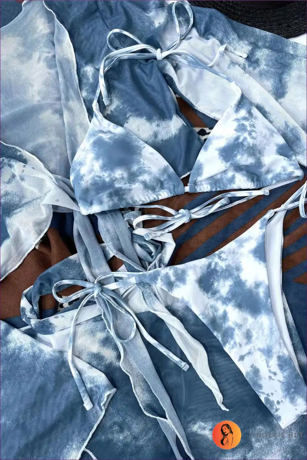 Make a Statement On The Beach With Our Stylish Side Tie Bikini Set. Floral Pattern, Halter Top,