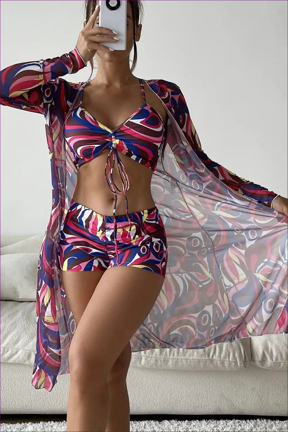 Make a Statement At The Beach With Our Stylish Three-piece Swimsuit Featuring High Waist And Long Sleeves.