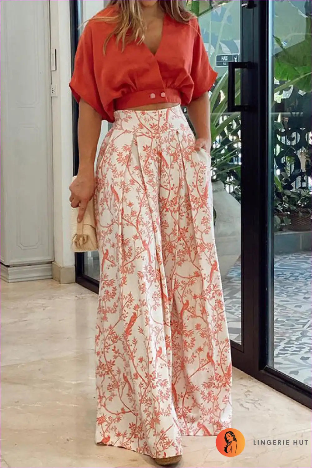 Upgrade Your Office Wardrobe With Our Sophisticated V-neck Short Shirt Top Printed Wide Leg Pants. Experience