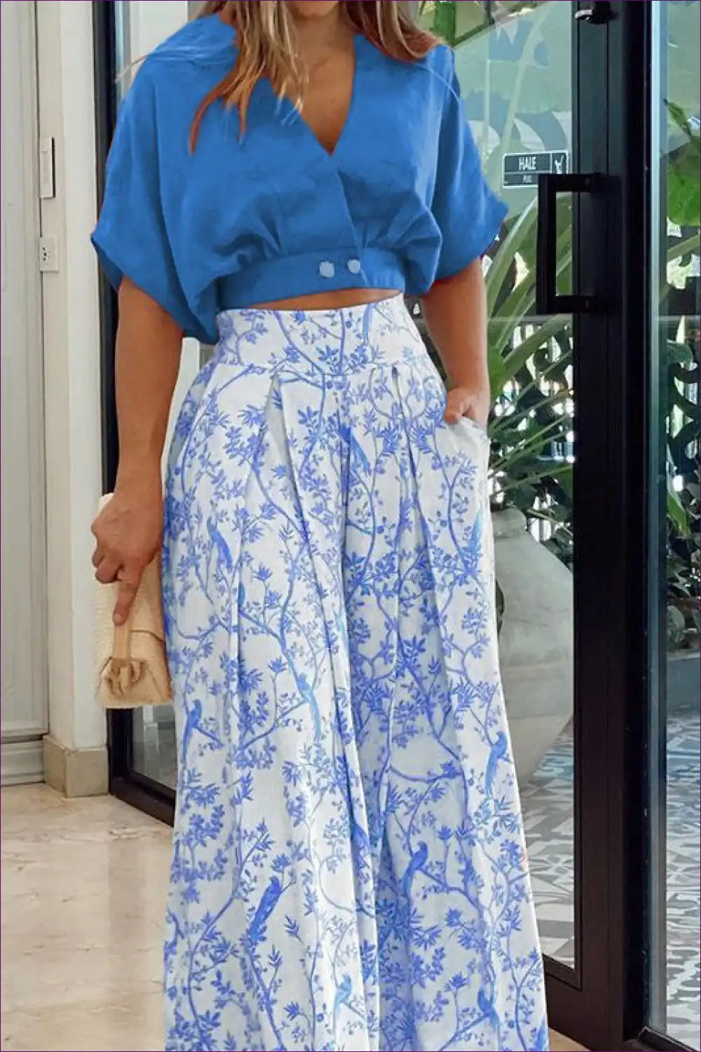 Upgrade Your Office Wardrobe With Our Sophisticated V-neck Short Shirt Top Printed Wide Leg Pants. Experience