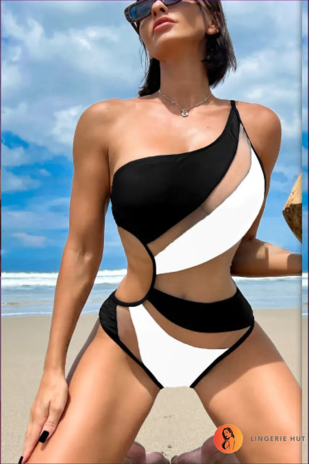 Dive Into The Allure Of Our Contrast Mesh One-shoulder Swimsuit, Featuring Captivating Cutouts And Delicate
