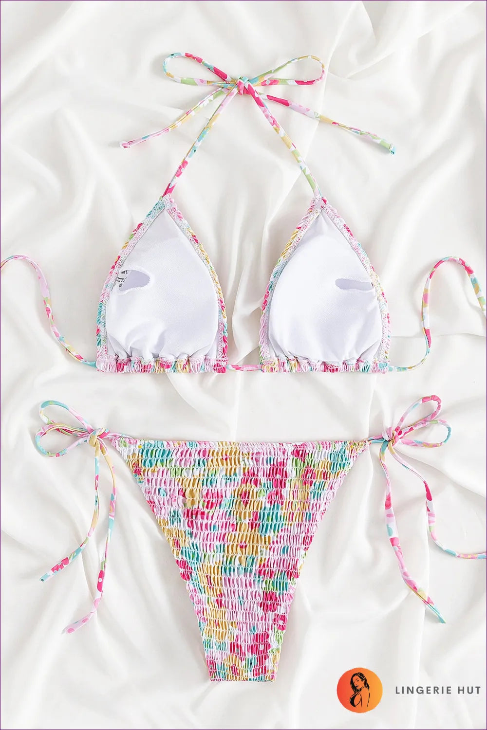 Turn Heads This Summer With Lingerie Hut’s Boho Chic Smocked Split Bikini. Limited Edition, Curve-enhancing,