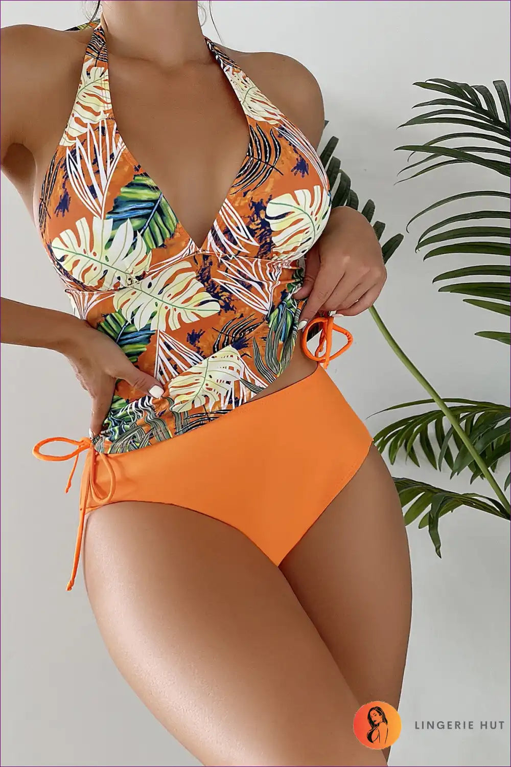 Embrace The Boho Spirit With Our Stunning Tropical Lace-up Bikini. Featuring a Captivating Leaf Print