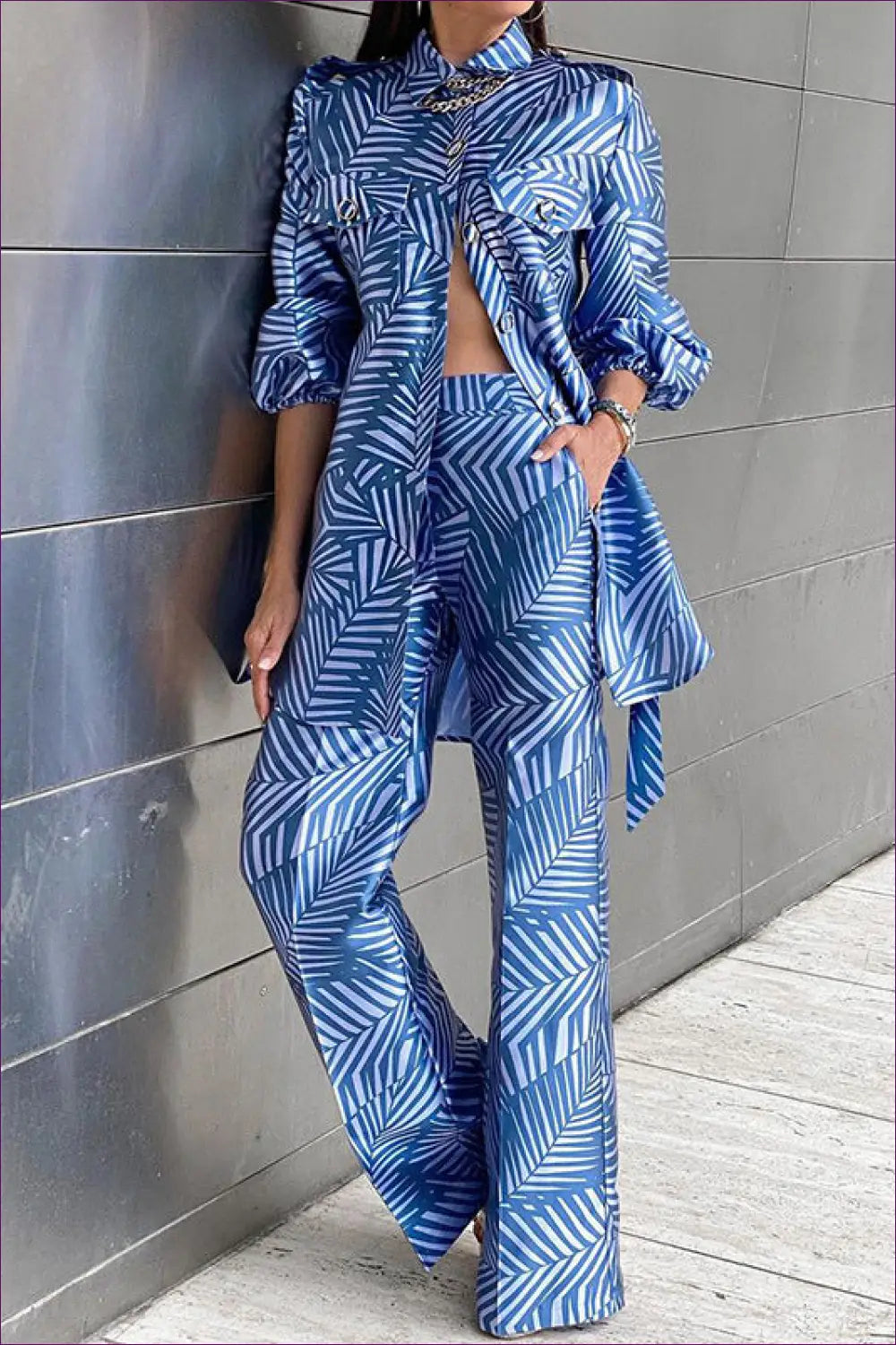 Redefine Casual Elegance With Our Chic Printed Cardigan & Trousers Set. Make a Statement Vibrant Prints