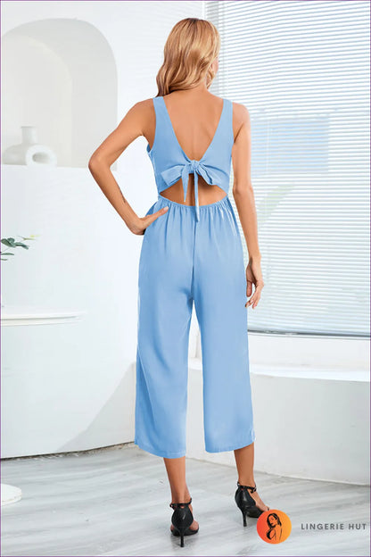 Elevate Your Style With Our Cut Out V-neck Jumpsuit. Flattering V-neck, Sassy Cut-out Design, And Elegant