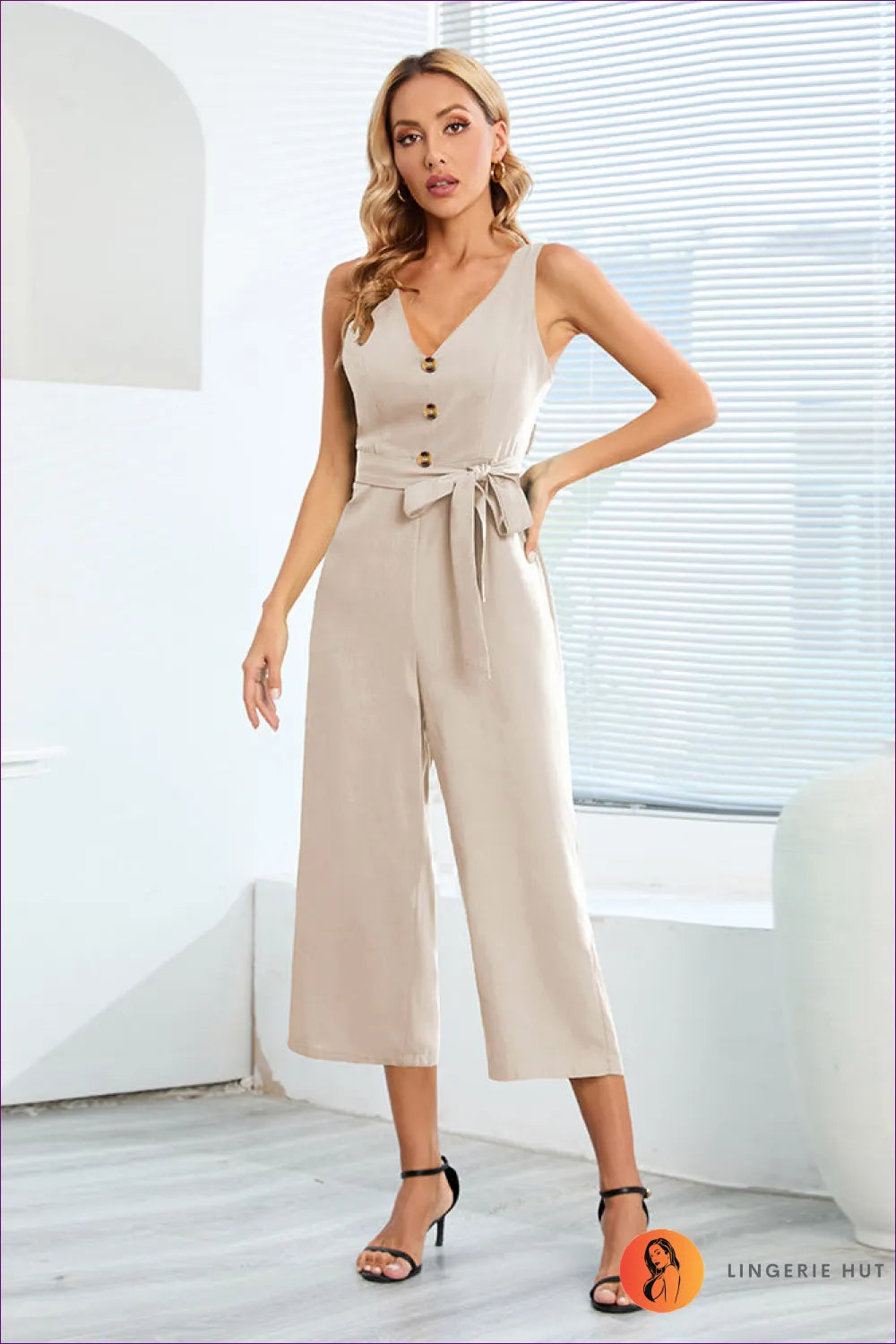 Elevate Your Style With Our Cut Out V-neck Jumpsuit. Flattering V-neck, Sassy Cut-out Design, And Elegant