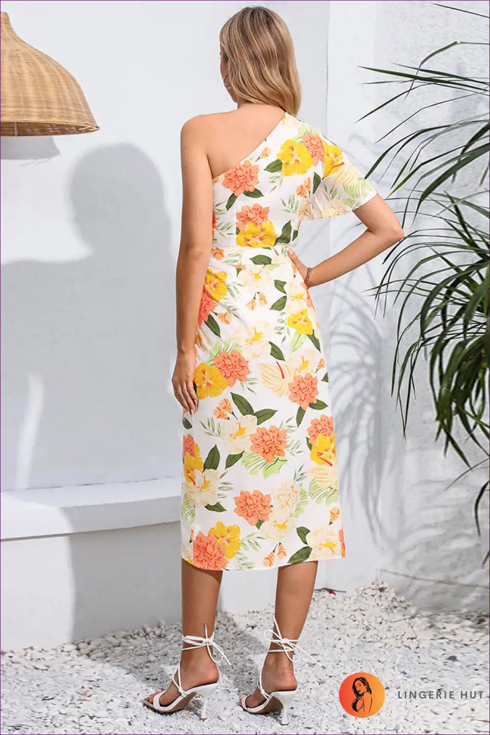 Get Ready To Turn Heads In Our Elegant Floral Asymmetric Dress! Fluttering Butterfly Sleeves And a Slim,