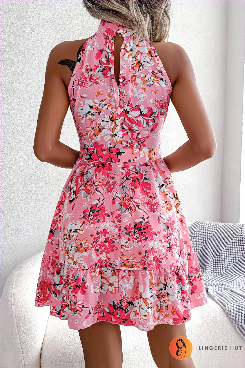 Add Elegance To Your Wardrobe With Our Elegant Floral Bow Tie Mini Dress. Delicate Floral Fabric, Bow Tie