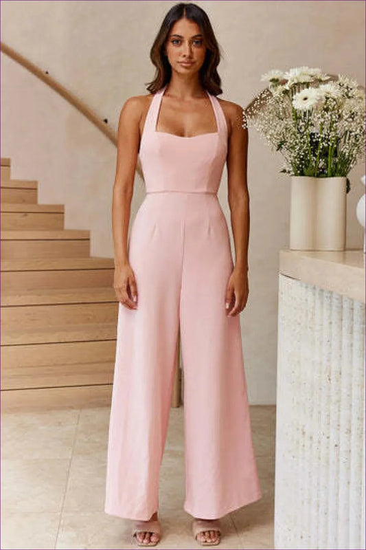 Elevate Your Style With Our Elegant Halter Backless Wide Leg Jumpsuit. Timeless Chic Meets Comfort And Allure.