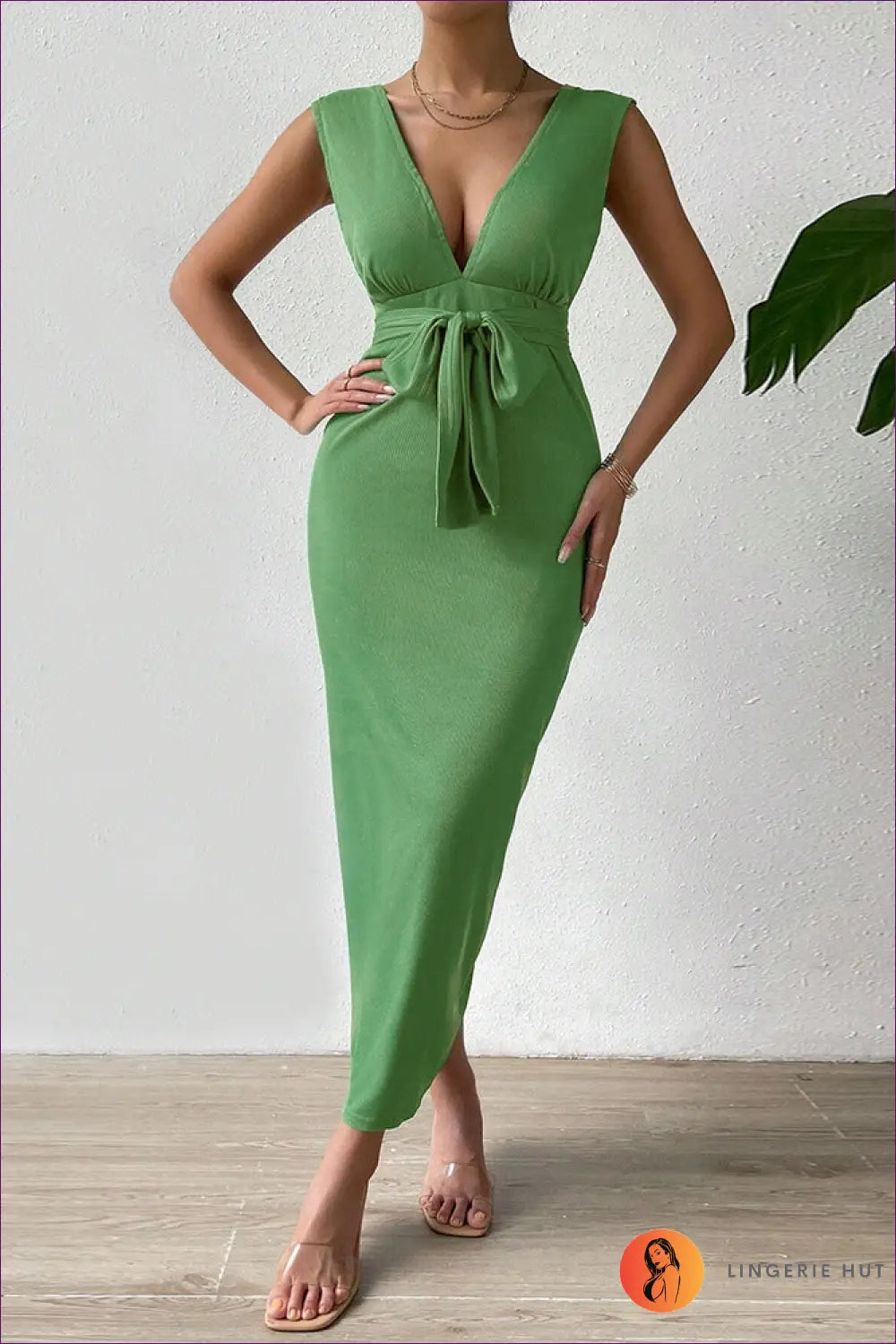 Make a Glamorous Statement In Our Elegant V-neck Maxi Dress. The Alluring Backless Tie Design And Slim Fit