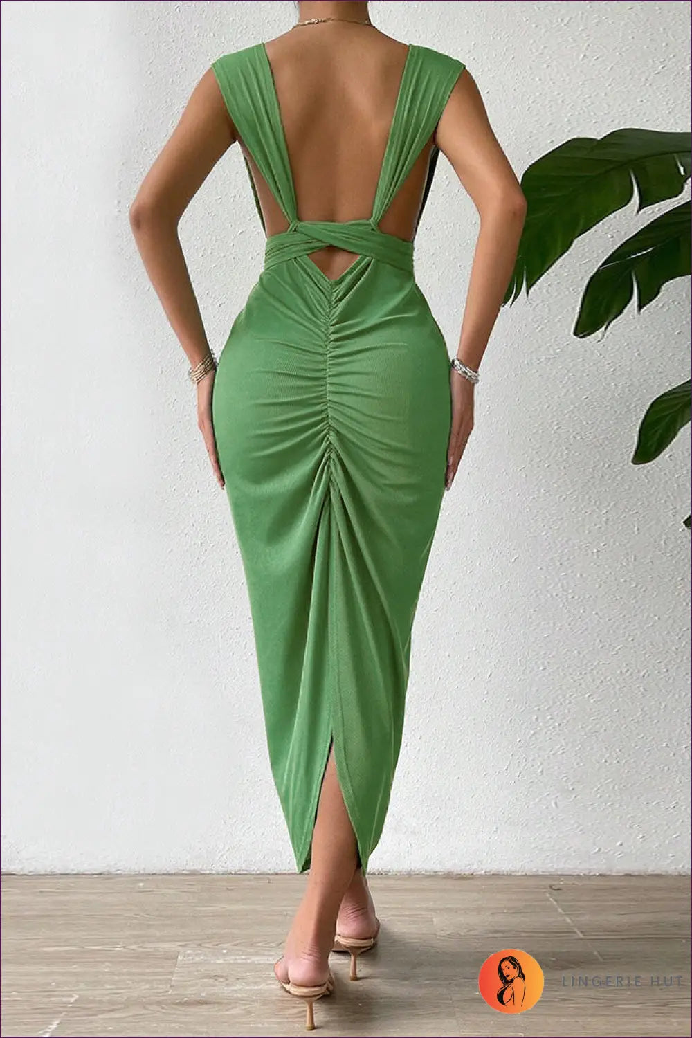 Make a Glamorous Statement In Our Elegant V-neck Maxi Dress. The Alluring Backless Tie Design And Slim Fit