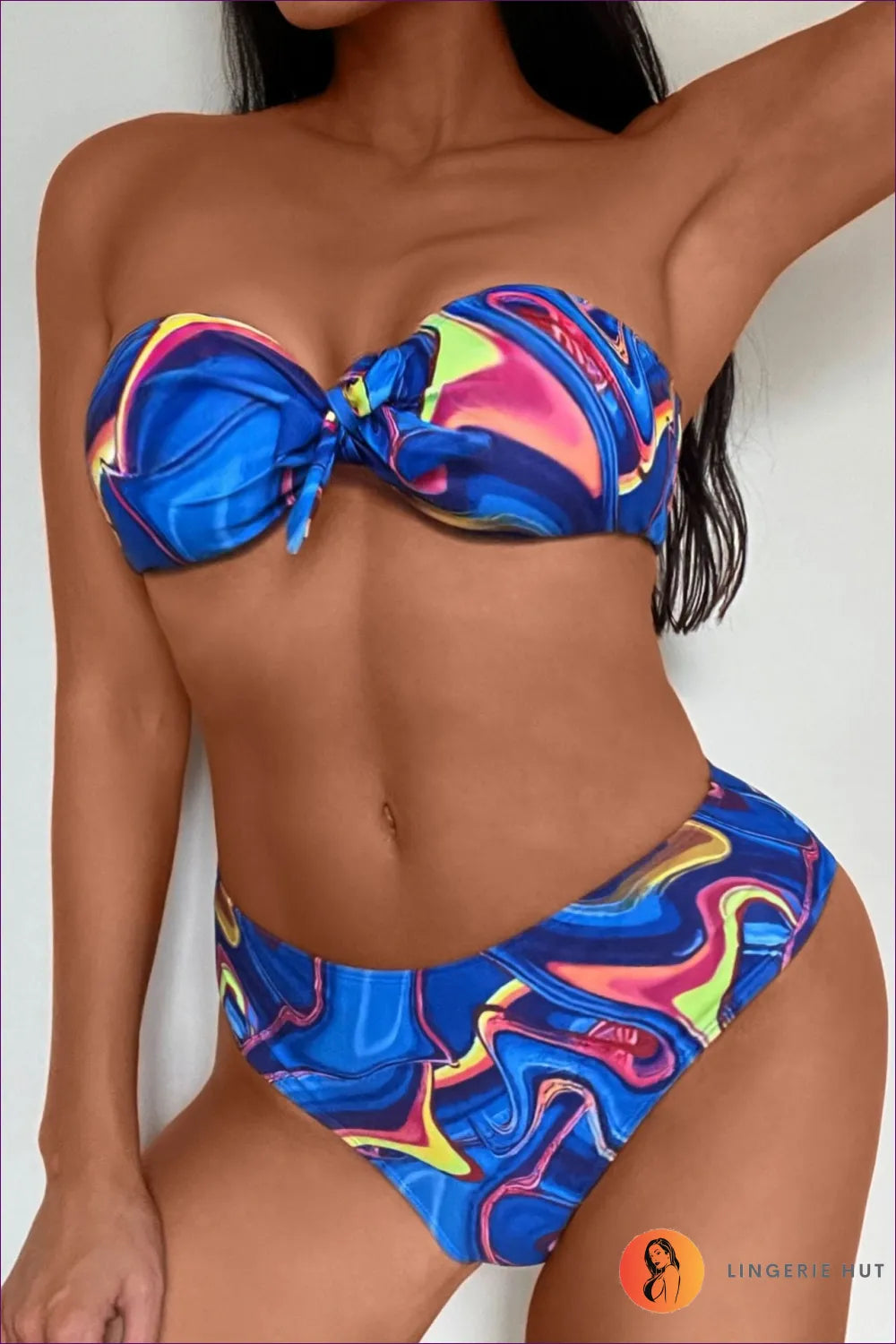 Elevate Your Beach Style With Our Exquisite Split Multi-color Printed Bikini. Designed To Make a Statement,