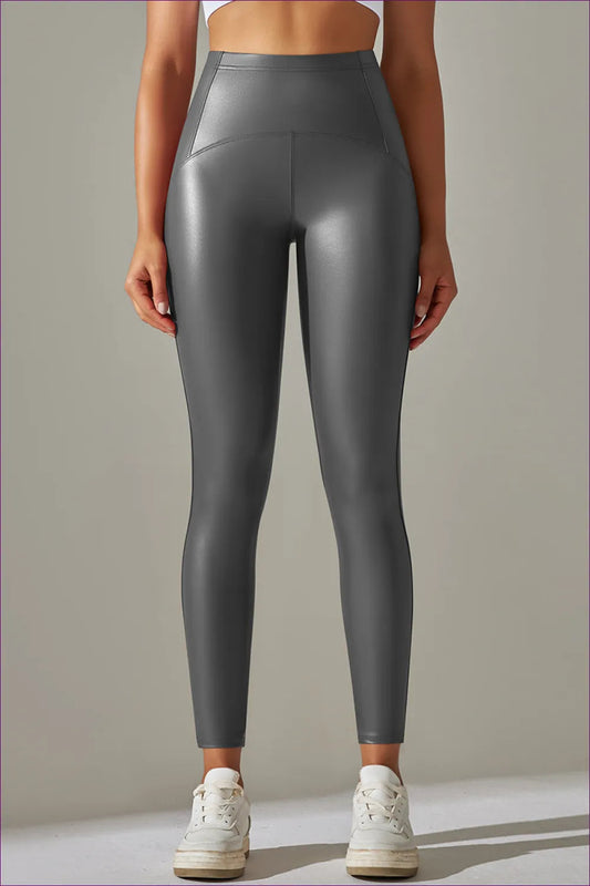 Elevate Your Active Lifestyle With Our Faux Leather Leggings. Featuring High Elasticity And a Bright Black