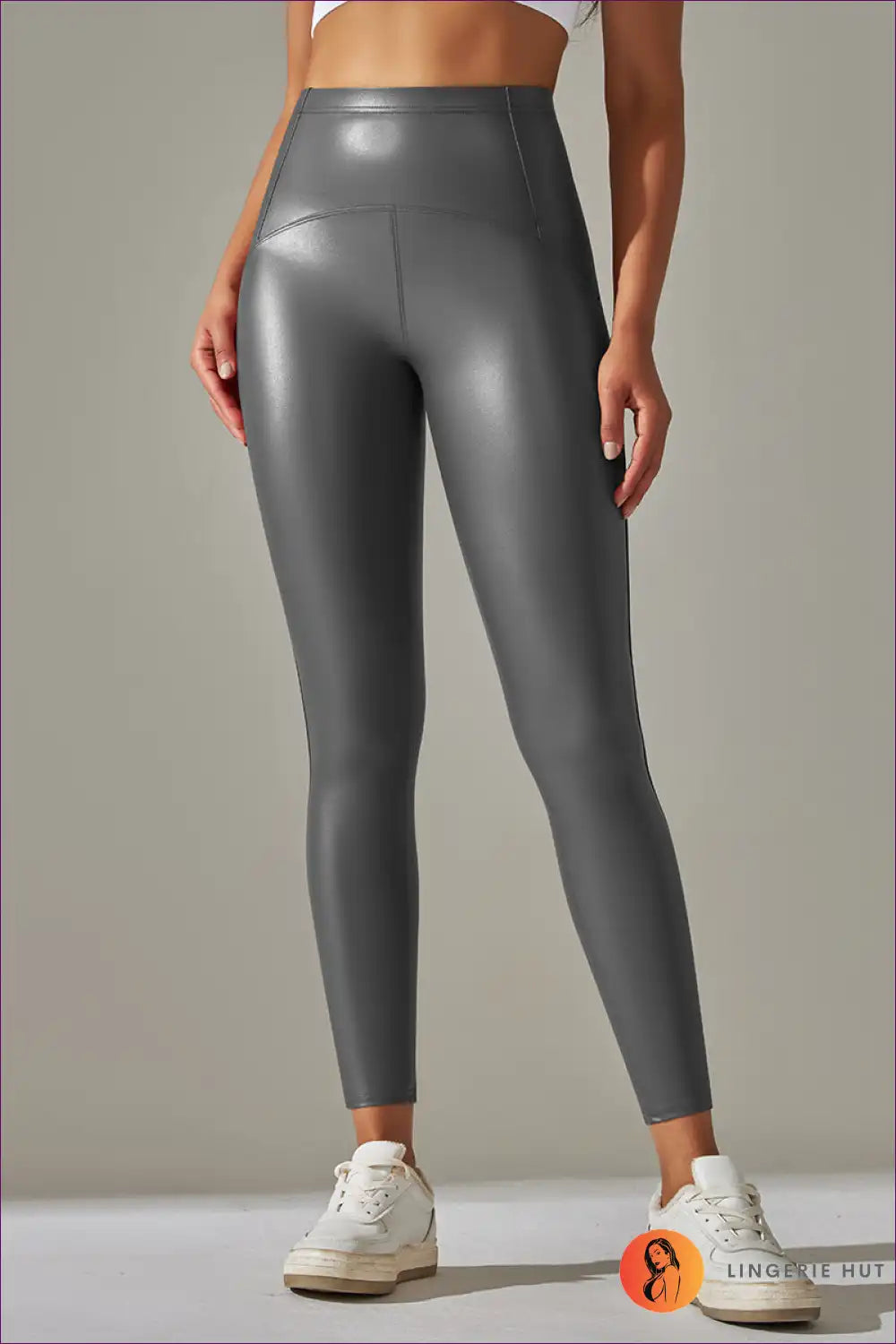 Elevate Your Active Lifestyle With Our Faux Leather Leggings. Featuring High Elasticity And a Bright Black