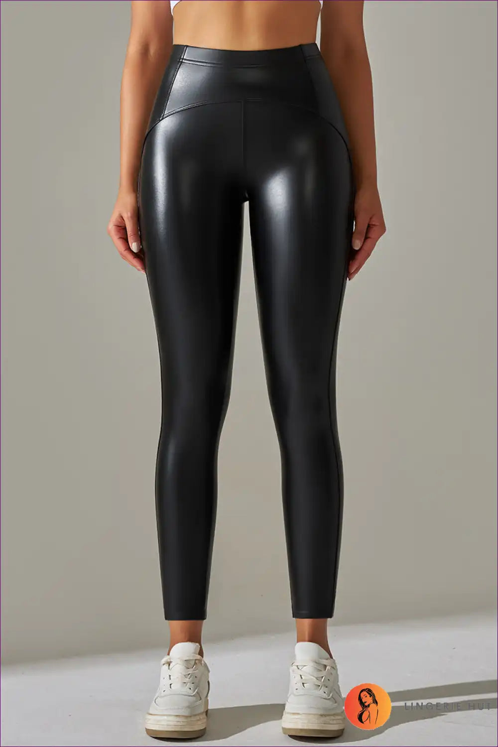 Elevate Your Active Lifestyle With Our Faux Leather Leggings. Featuring High Elasticity And a Bright Black