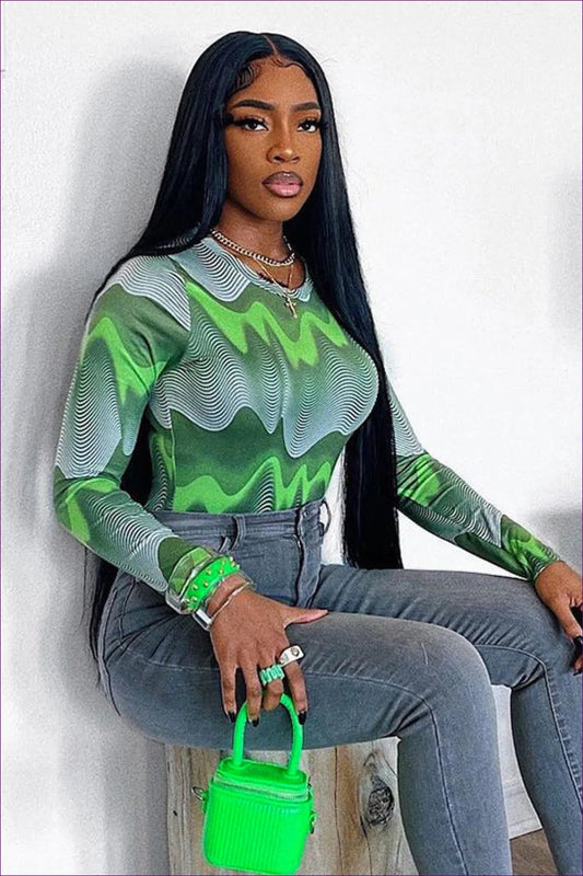 Elevate Your Outfit With Our Green Print Round Neck Long Sleeve Bodysuit. Eye-catching, Comfortable,