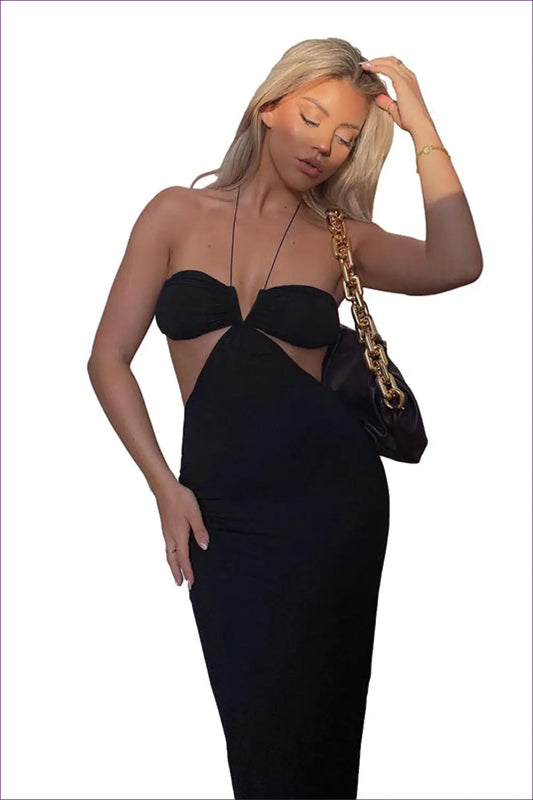 Make a Stylish Summer Statement In Our Halter Cut Out Maxi Dress. Sleeveless With Unique Halter Neckline