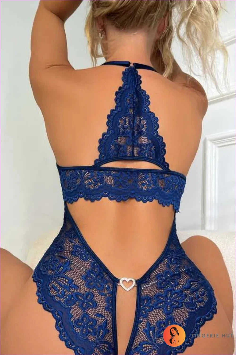 Elevate Your Style With Our Lace Heart Detail Halter Backless Bodysuit. Featuring Exquisite Embroidery,