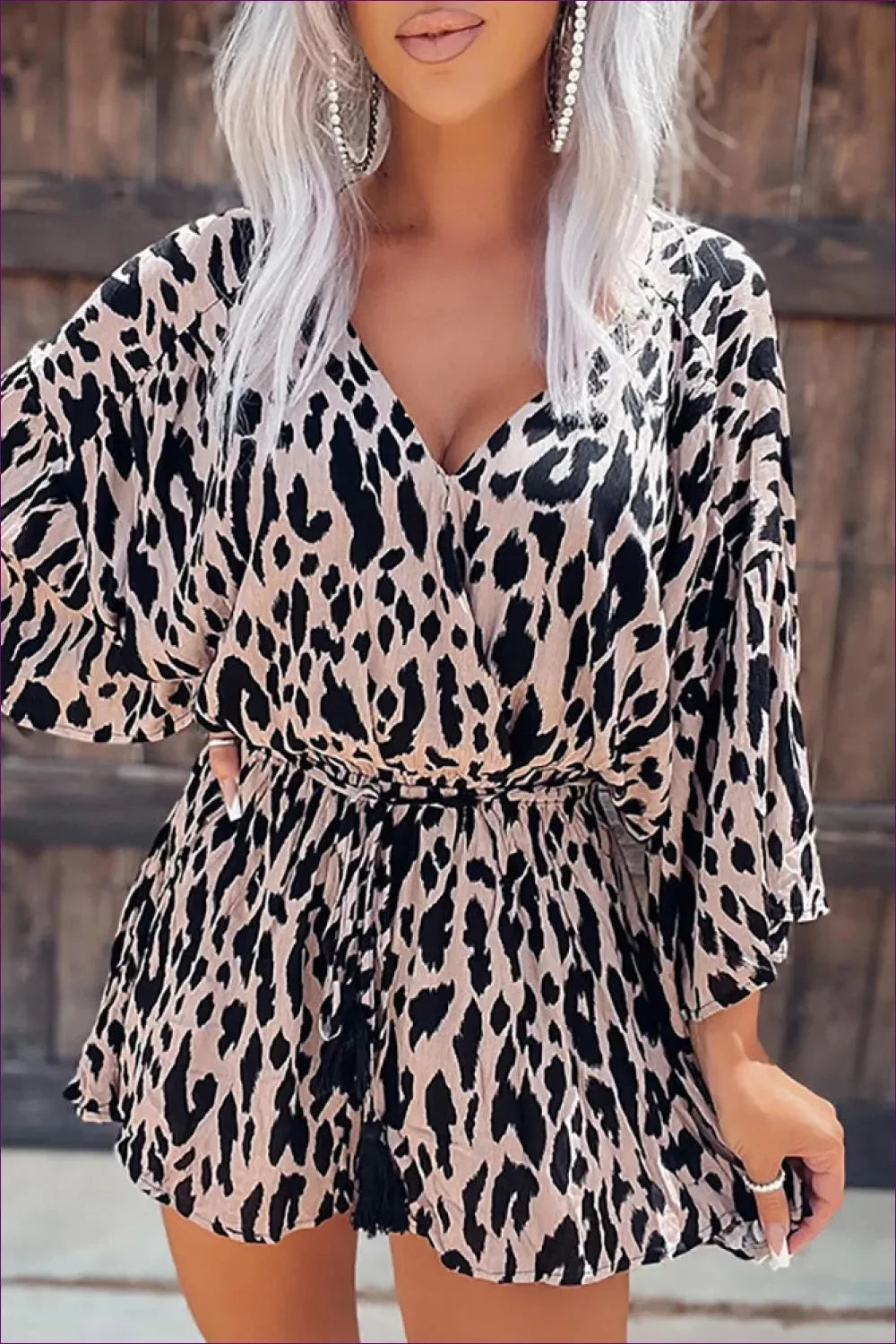 Command The Room With Primal Roar Of Elegance In Our Lantern Sleeve Leopard Print Playsuit. Your Statement