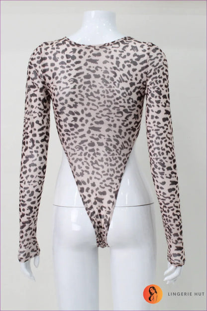 Get Ready To Turn Heads With Our Leopard Print Cut Out Long Sleeve Bodysuit. Allover Leopard Print, Daring