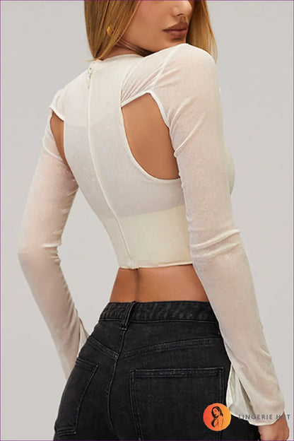 Dare To Be Daring With Our Mesh Sheer Cut Out Tie Long Sleeve Crop Top. Edgy Mesh Fabrication, Cutout Detail,