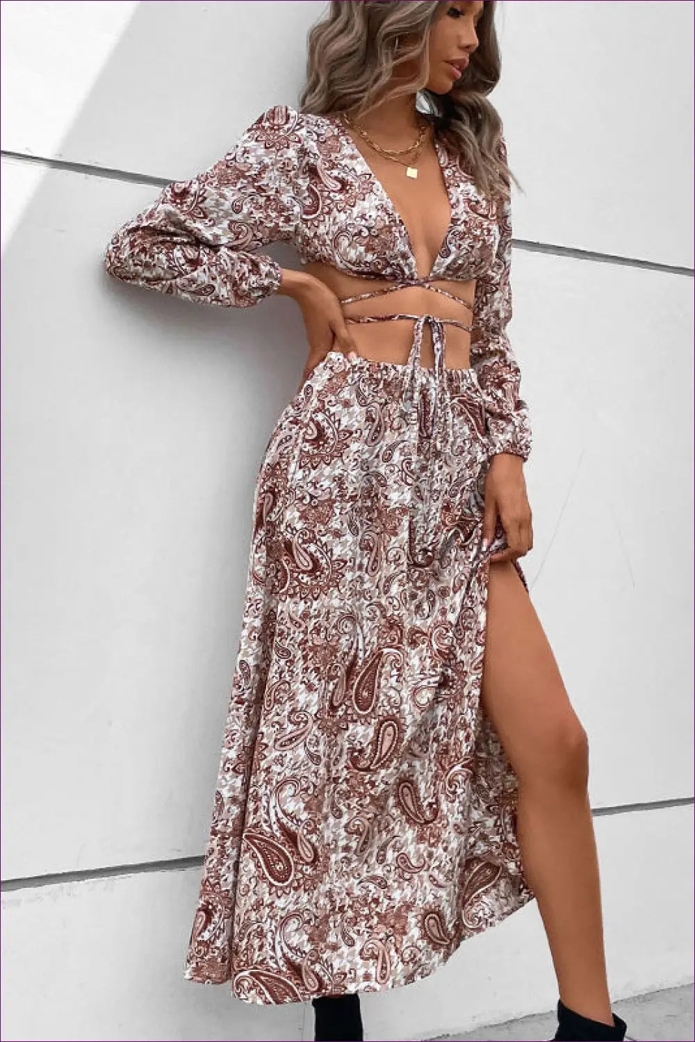 Sizzle In Our Paisley Split Set. Embrace Sexy Elegance With a Revealing Split And Chic V-neckline. Perfect For