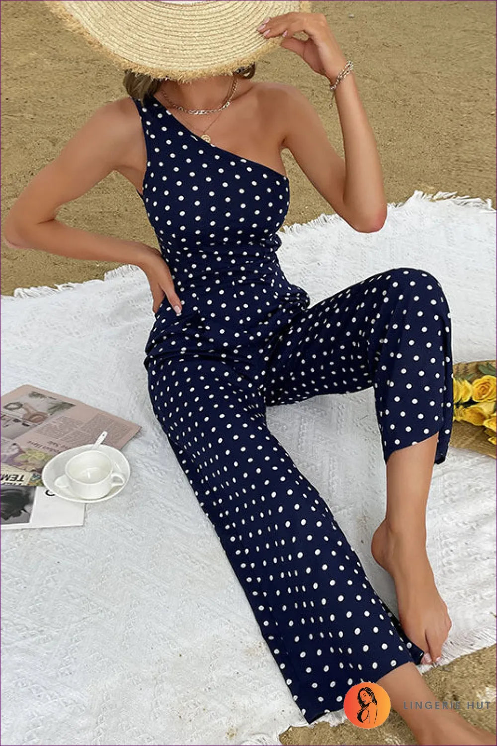 Embrace Chic Elegance With Lingerie Hut’s Polka Dot Bootcut One Shoulder Jumpsuit. Slim Fit Meets Unique
