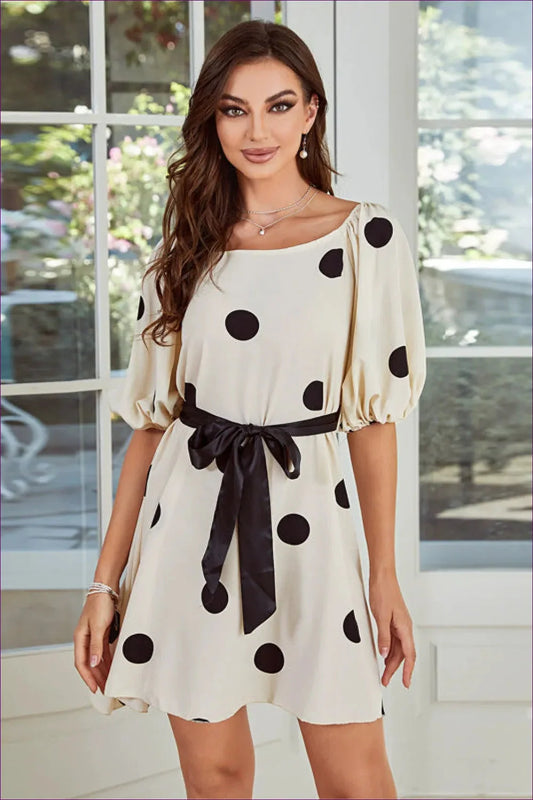 Elevate Your Style With Our Chic Polka Dot Puff Sleeve Dress. Timeless Elegance Meets Playful Charm For