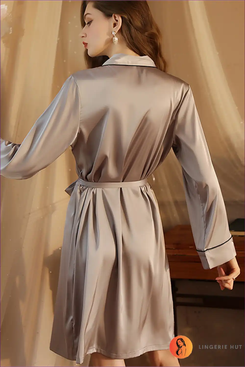 Elevate Your Mornings And Evenings With Our Satin Morning Gown. Featuring a Belted Waist Long Sleeves, This