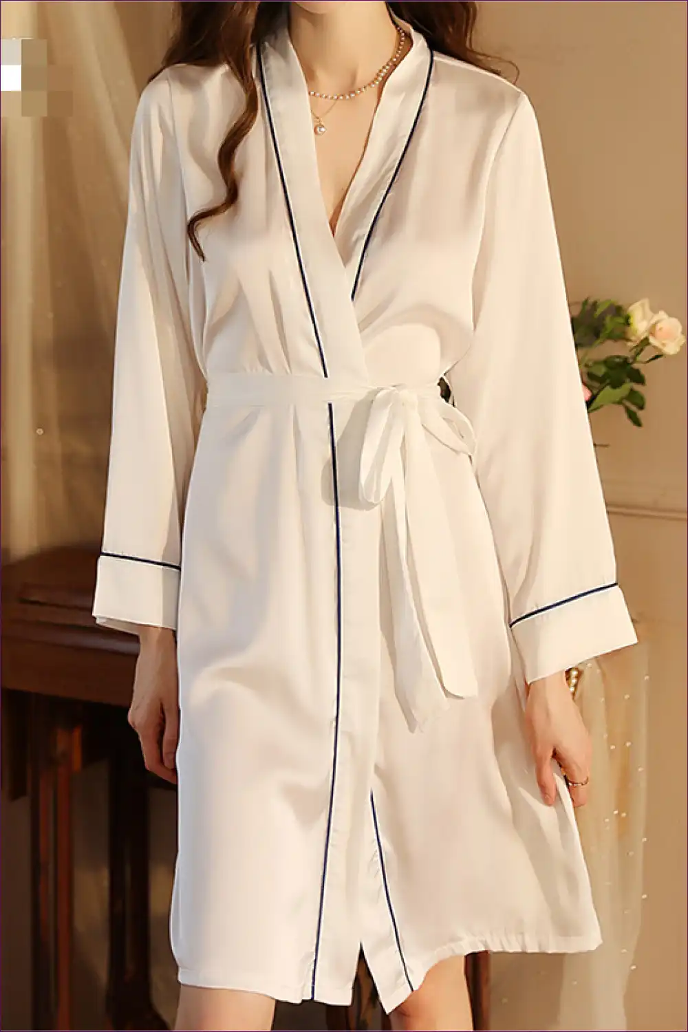 Elevate Your Mornings And Evenings With Our Satin Morning Gown. Featuring a Belted Waist Long Sleeves, This