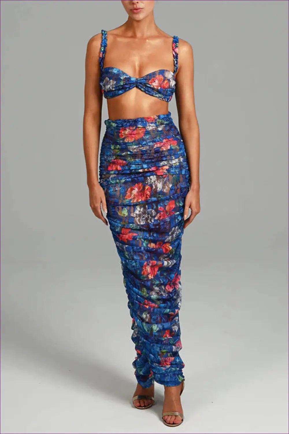 Get Ready To Embrace Summer Elegance With Our Sexy Floral Print Crop Top And Ruched Maxi Skirt Set! Accentuate