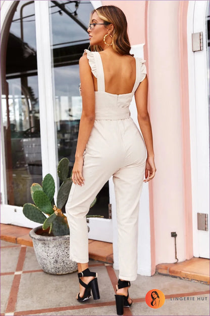 Redefine Your Elegance With Our Sophisticated Ruffle Sleeveless Jumpsuit. Elevate Style Effortlessly This