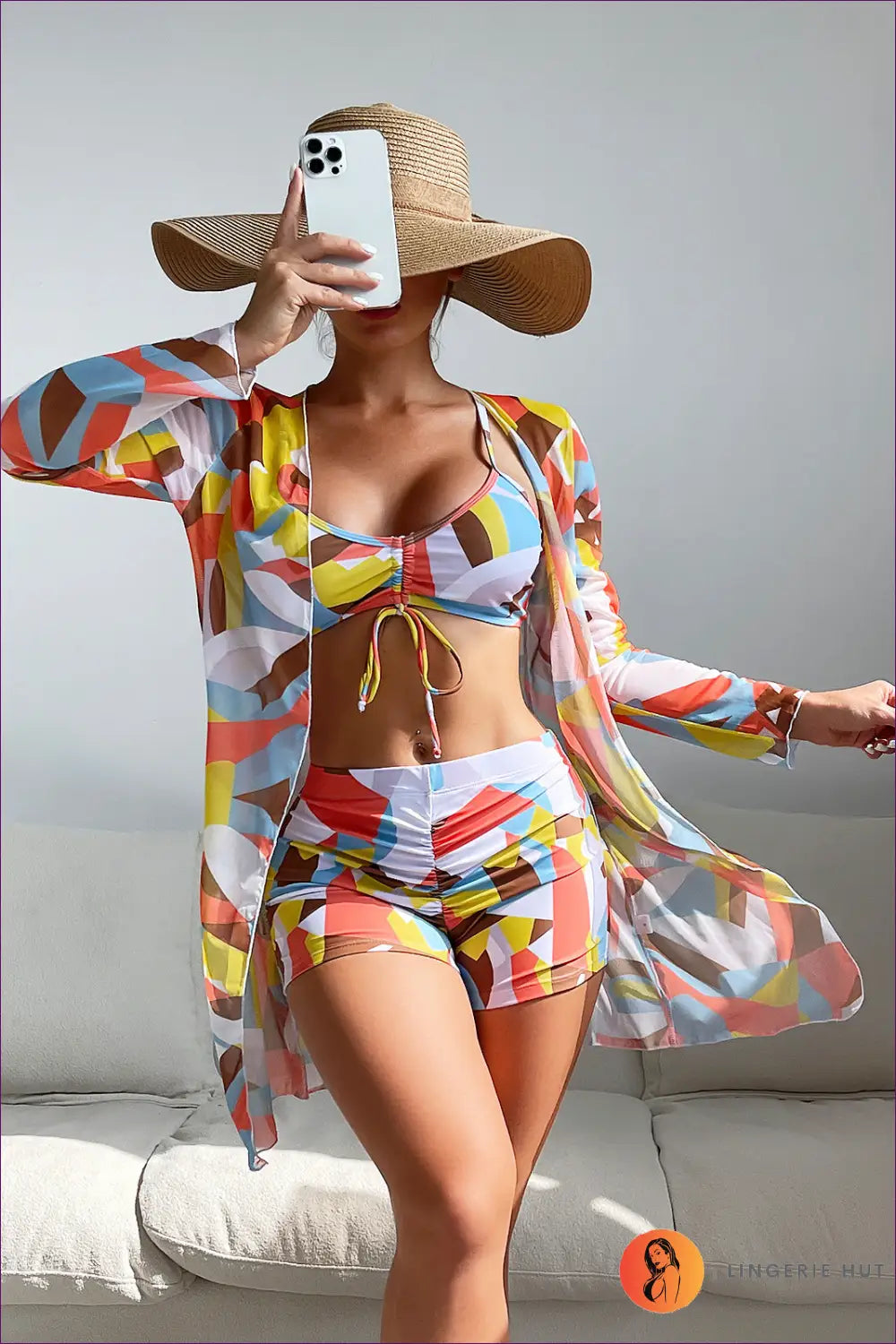 Make a Statement At The Beach With Our Stylish Three-piece Swimsuit Featuring High Waist And Long Sleeves.