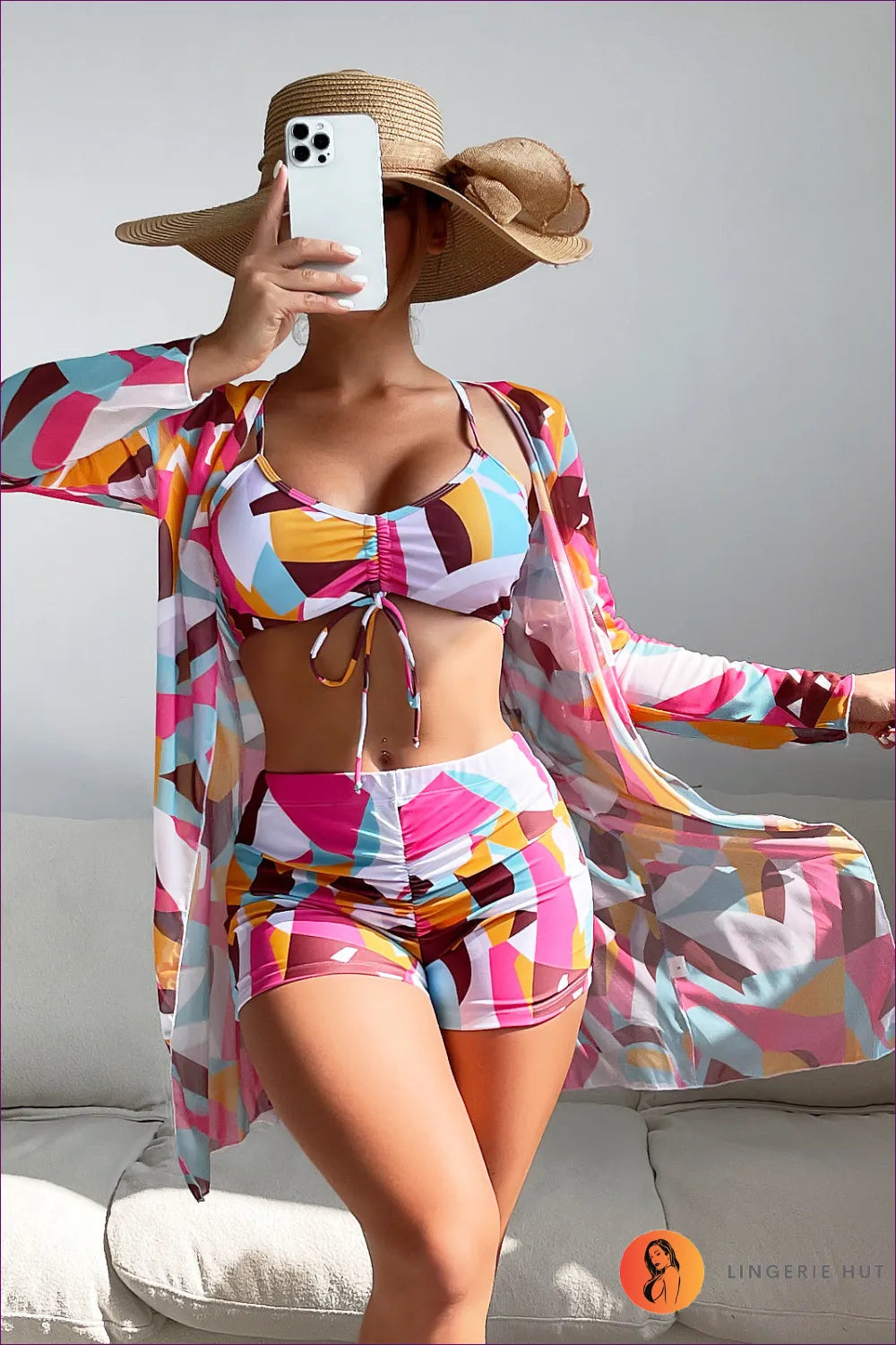 Make a Statement At The Beach With Our Stylish Three-piece Swimsuit Featuring High Waist And Long Sleeves.