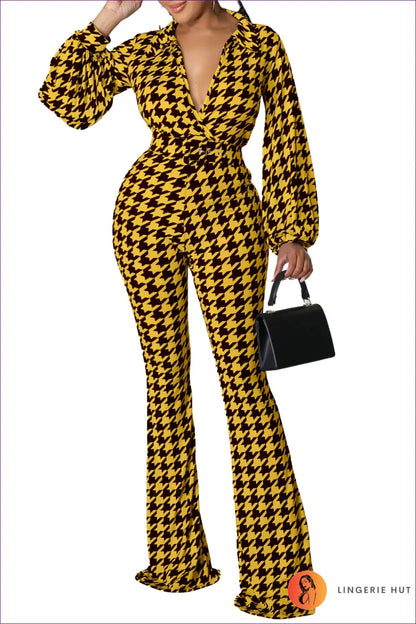 Step Into The Season With Lingerie Hut’s Tartan Wide Leg Jumpsuit. Belted Waist, Lantern Sleeves, And Slim Fit