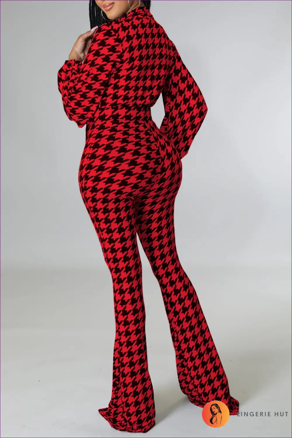 Step Into The Season With Lingerie Hut’s Tartan Wide Leg Jumpsuit. Belted Waist, Lantern Sleeves, And Slim Fit