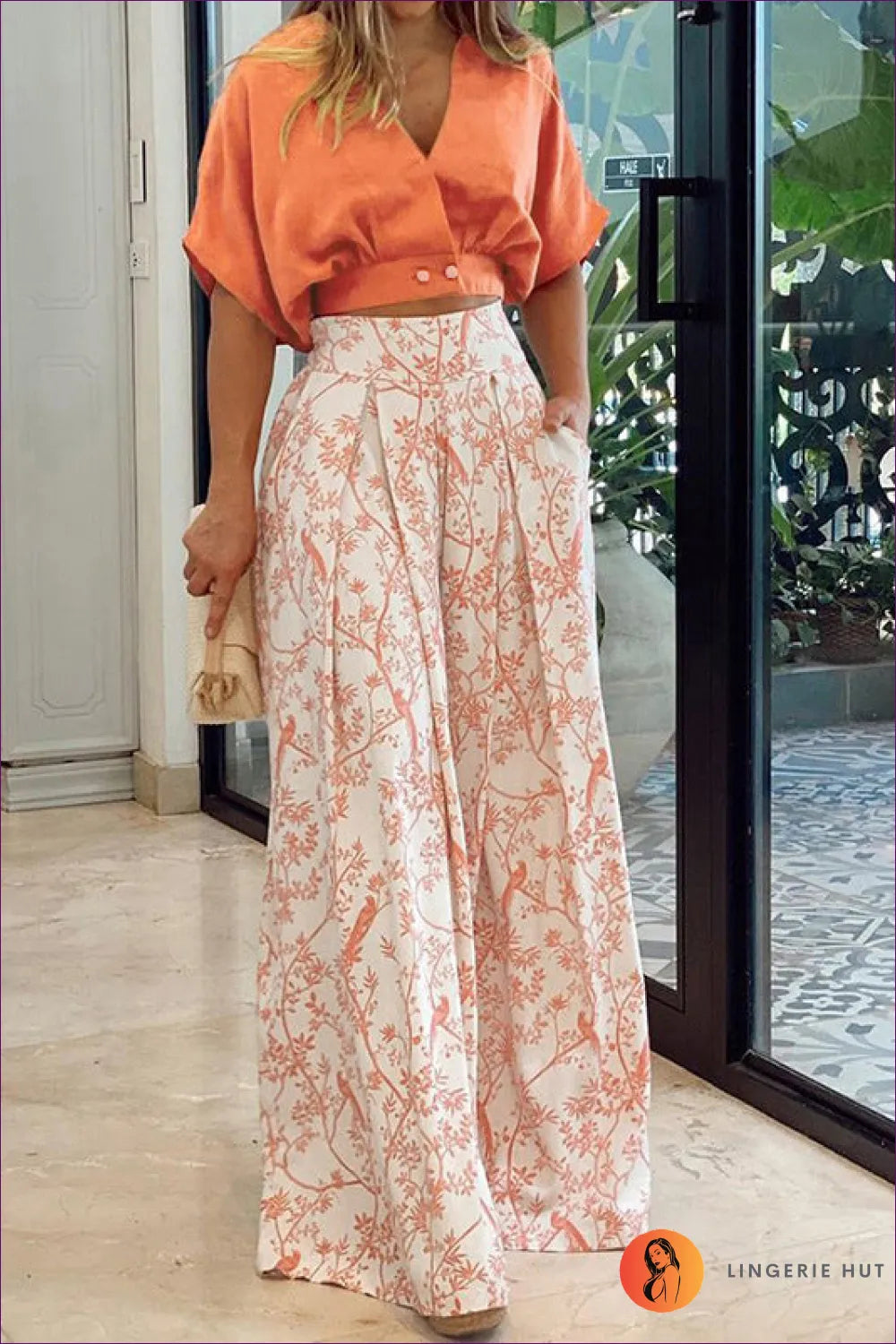 Upgrade Your Office Wardrobe With Our Sophisticated V-neck Short Shirt Top Printed Wide Leg Pants. Experience