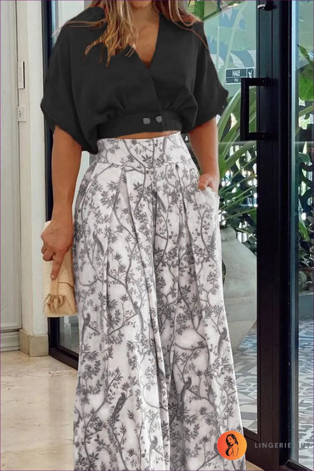 Upgrade Your Office Wardrobe With Our Sophisticated V-neck Short Shirt Top Printed Wide Leg Pants. Experience
