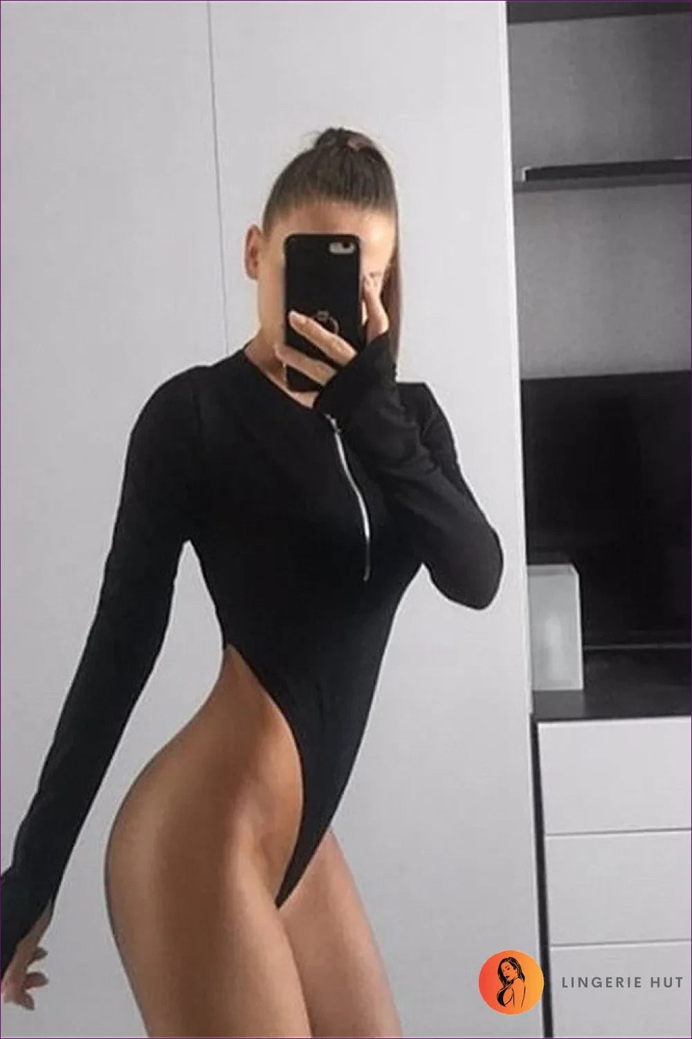 Get Ready To Turn Heads With Our v Neck Zip High Cut Long Sleeve Thong Bodysuit. Feel Both Sexy